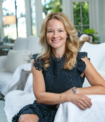 Portrait of Jenna Kooi, Real Estate Advisor.